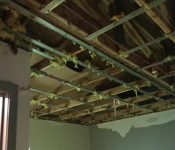 Ceiling ruined by water damage. 